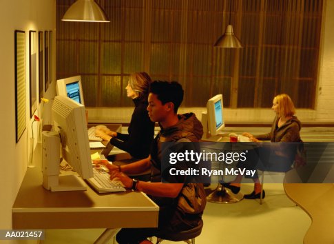 People Using Computers in an Internet Caf? People Using Computers in an Internet Caf?