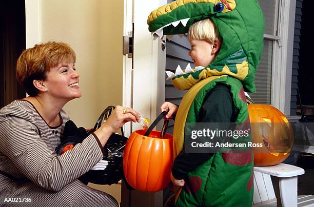 Out Getting Candy Handing Out Candy Halloween Photos and Premium High Res Pictures ...