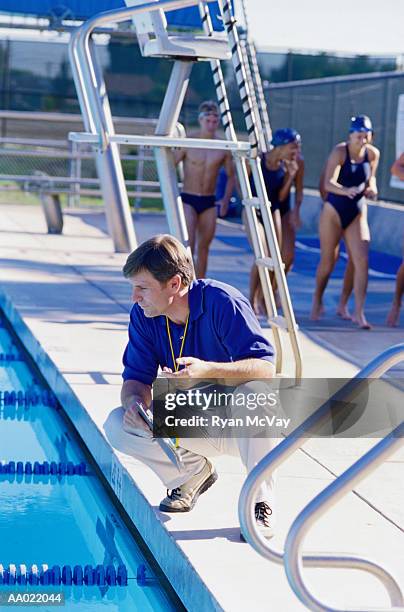 Pool Crounching Swim Coach Timer Photos and Premium High Res Pictures - Getty Images