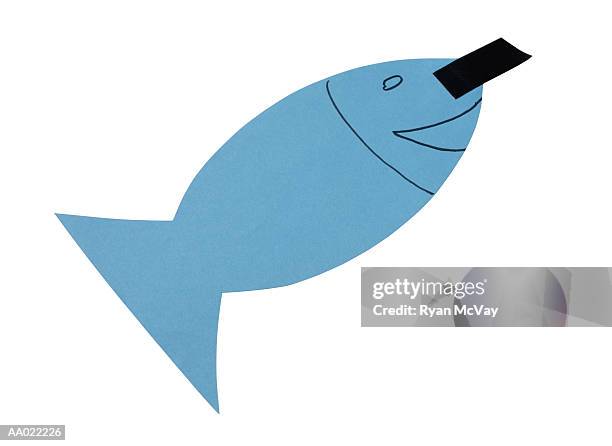 paper fish for a french april fools day joke - april fools stock-fotos und bilder