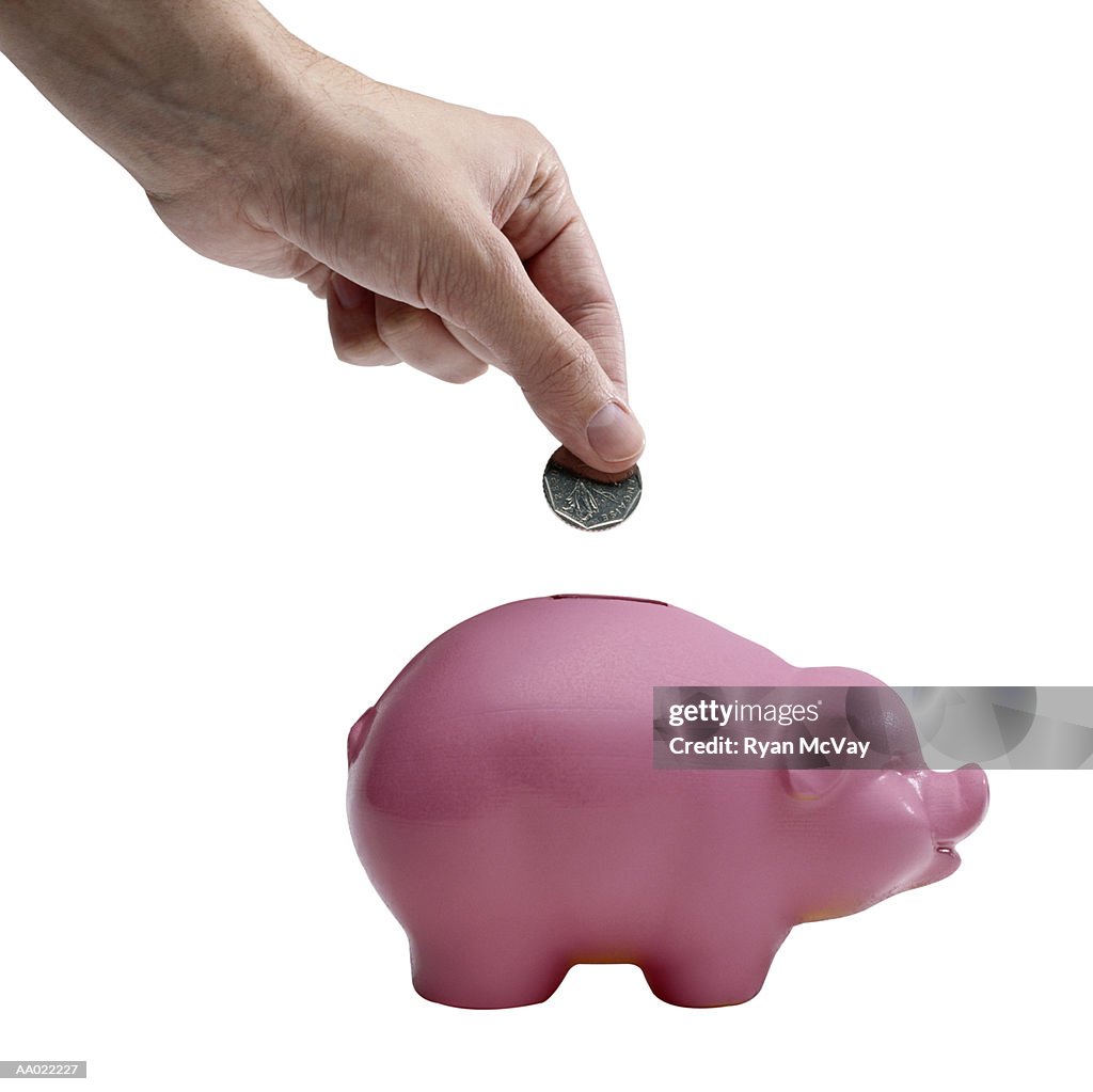 Dropping a Coin into a Piggy Bank