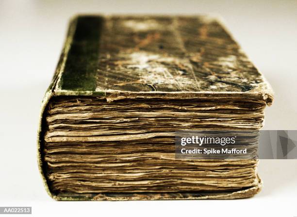 close-up of an old book - old book white background stock pictures, royalty-free photos & images