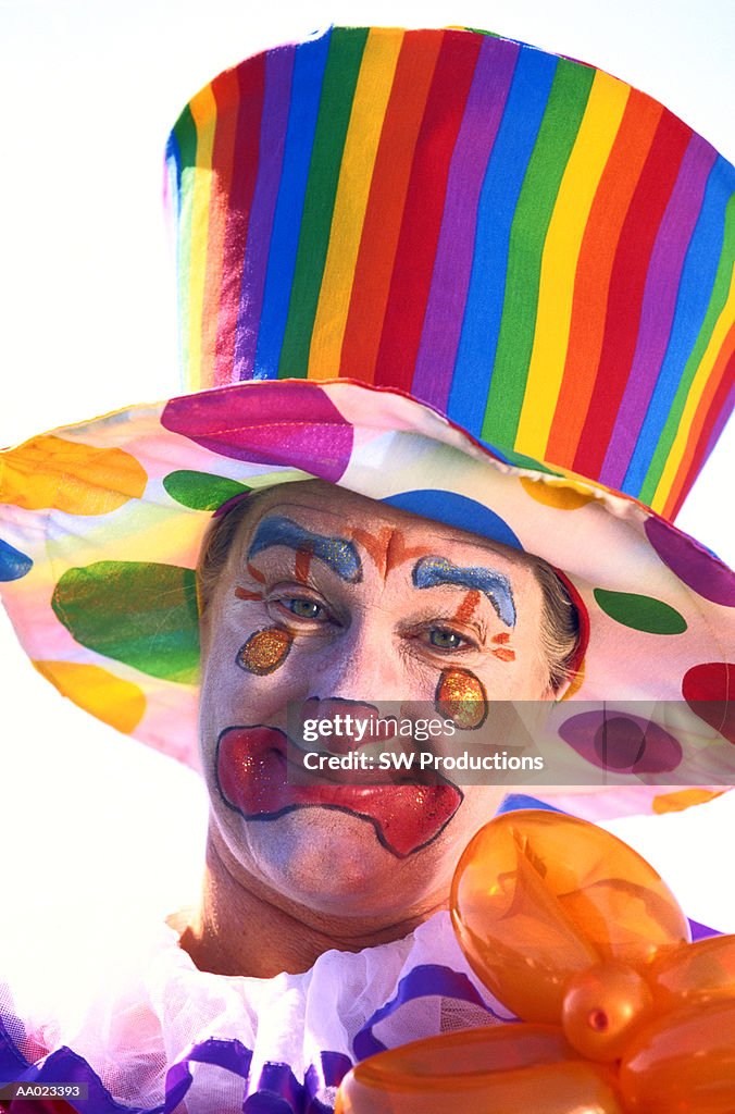 Clown in a Multicolored Top Hat