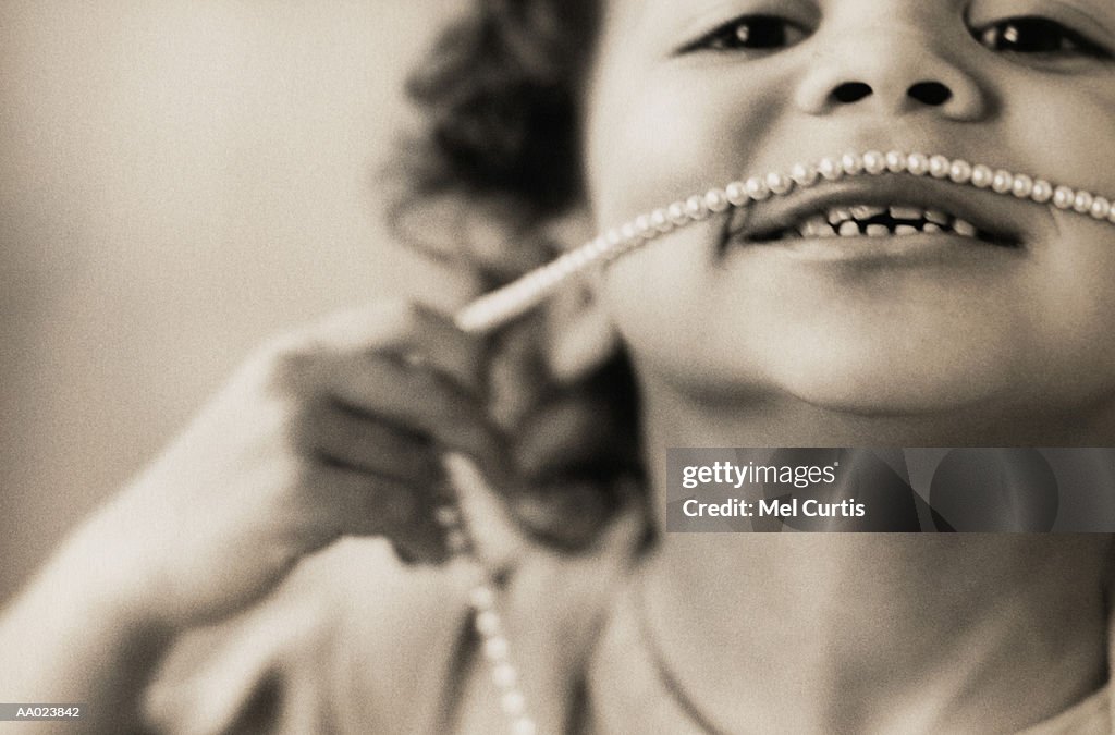 Girl With a String of Pearls