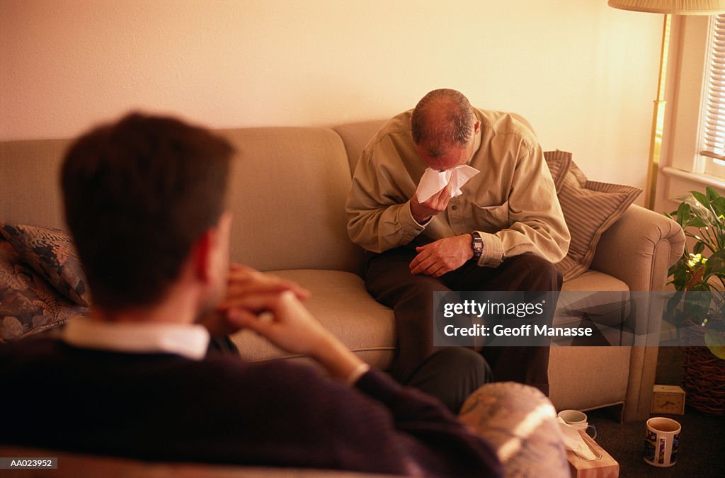 Psychologist and Crying Patient in Therapy Session