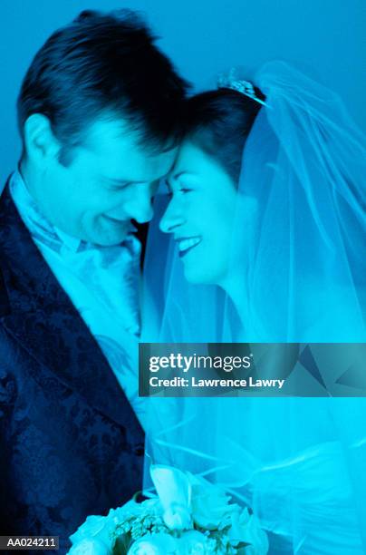 bride and groom laughing - two toned dress stockfoto's en -beelden