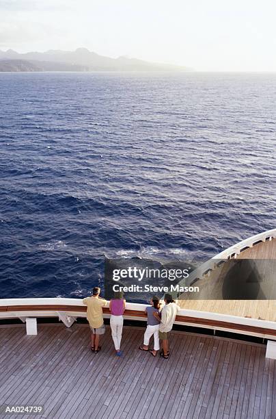 couples on deck of cruise ship - schiffsdeck stock-fotos und bilder