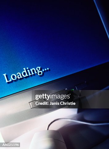 Close-up of a Computer Loading Data Close-up of a Computer Loading Data