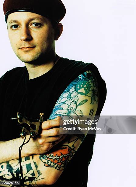 tattoo artist holding needle, portrait - painter beret stock pictures, royalty-free photos & images