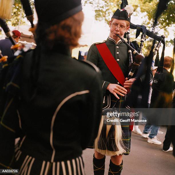 bagpipes - traditional musician stock pictures, royalty-free photos & images