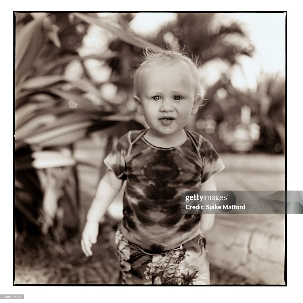 Toddler in a T-Shirt with Saliva on His Face