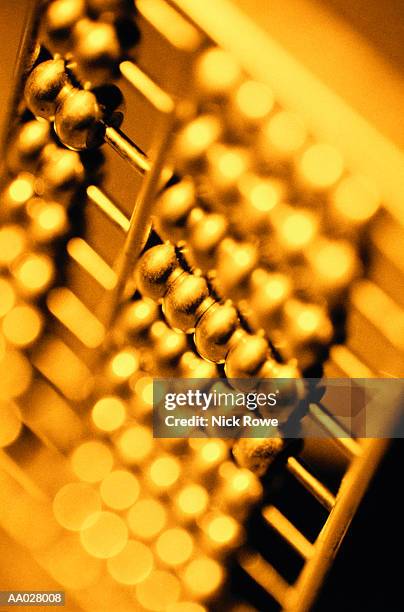 detail of an abacus - gold abacus stock pictures, royalty-free photos & images