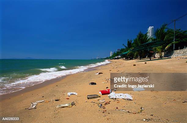 litter on a thai beach - chonburi province stock pictures, royalty-free photos & images