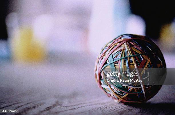 rubber band ball - elastic band ball stock pictures, royalty-free photos & images