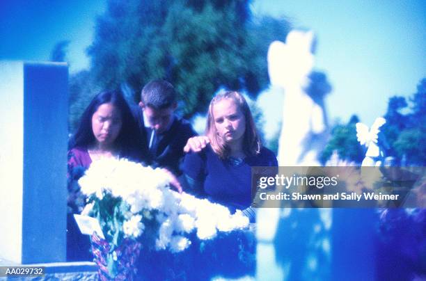 teenagers mourning at funeral - funeral of manchester arena terror attack victim takes place stockfoto's en -beelden