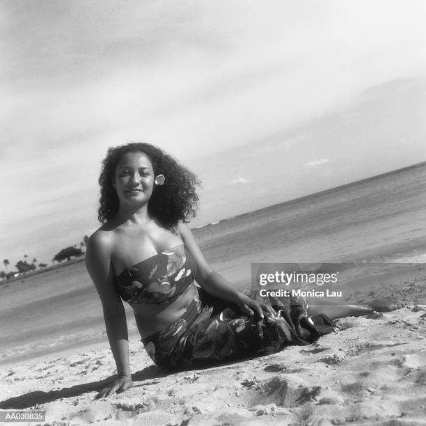 woman reclining on a beach - monica askew stock pictures, royalty-free photos & images