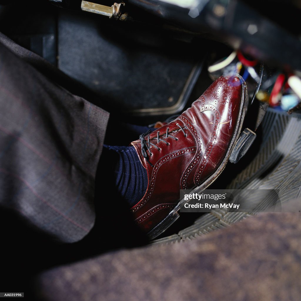 Close-Up of a Man Driving a Car