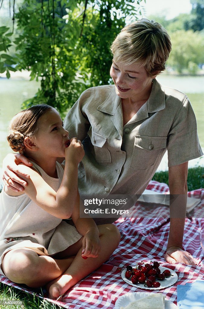 Young Girl and Her Mother Having a Picnic