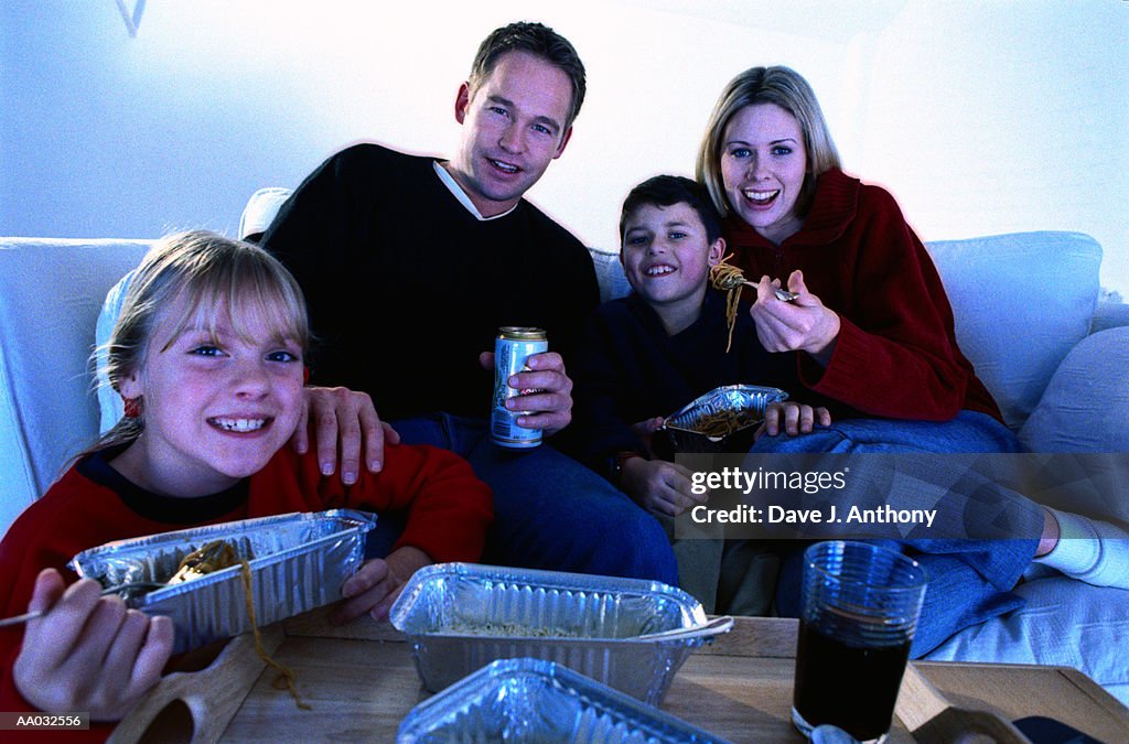 Family Eating and Watching Television