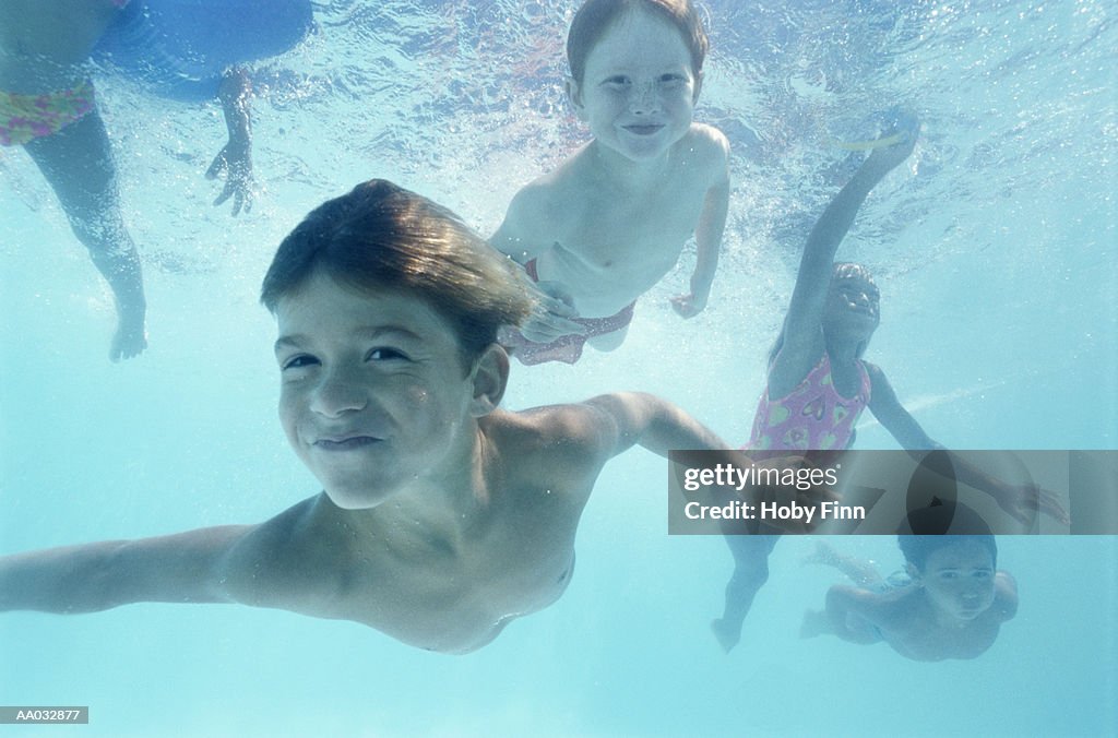 Underwater Portrait of Children Swimming