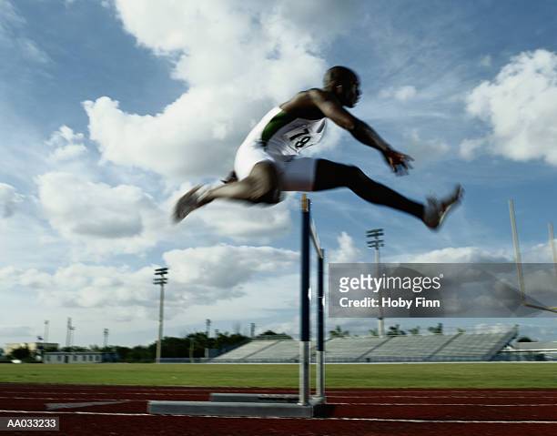 hurdler - hurdle stock pictures, royalty-free photos & images