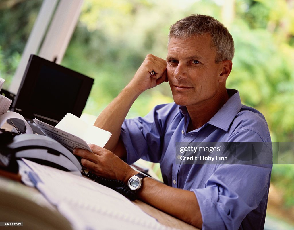 Portrait of a Man in His Home Office