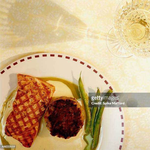grilled salmon and potato cake - pastel de patata fotografías e imágenes de stock