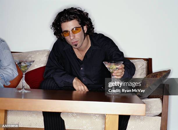 young man drinking martini - soul patch stock pictures, royalty-free photos & images