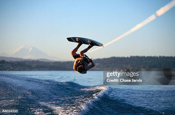wakeboarder jumping on lake washington, wa - jarvis summers stock pictures, royalty-free photos & images