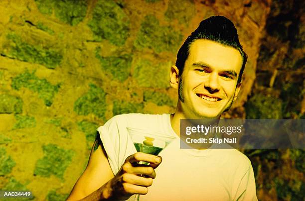 rockabilly in club with martini glass - rockabilly stock photos et images de collection