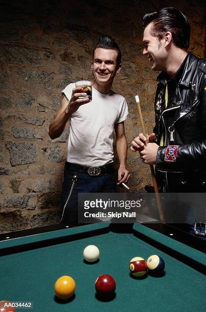 two friends playing pool - rockabilly ストックフォトと画像