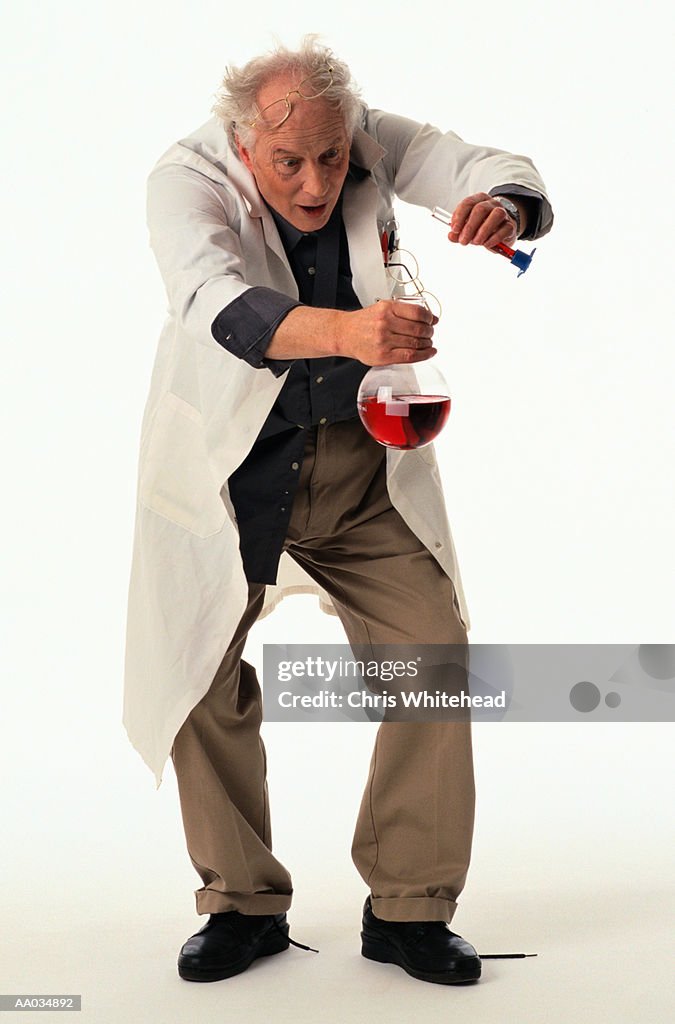 Scientist Experimenting with Chemicals