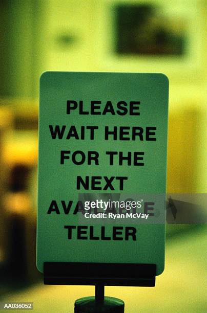 please wait sign in a bank - wait sign sign stock pictures, royalty-free photos & images
