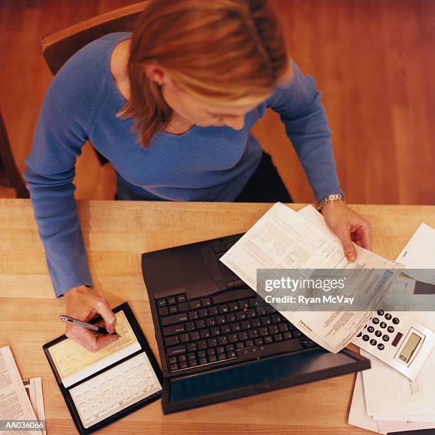 Woman Writecheck 239 Woman Writing A Check Stock Photos, High-Res Pictures, and Images ...