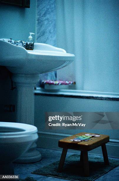 stool in a bathroom - taburete pequeño fotografías e imágenes de stock
