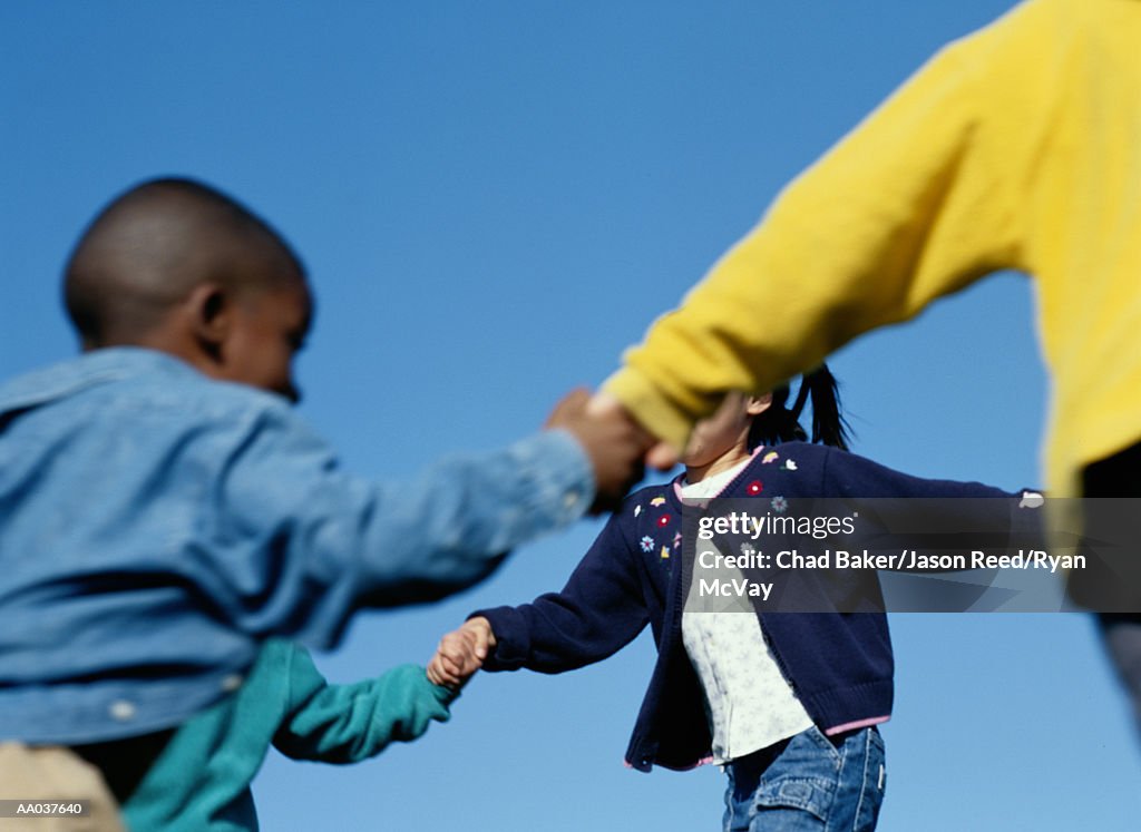 Children Playing Ring-Around-The-Rosy