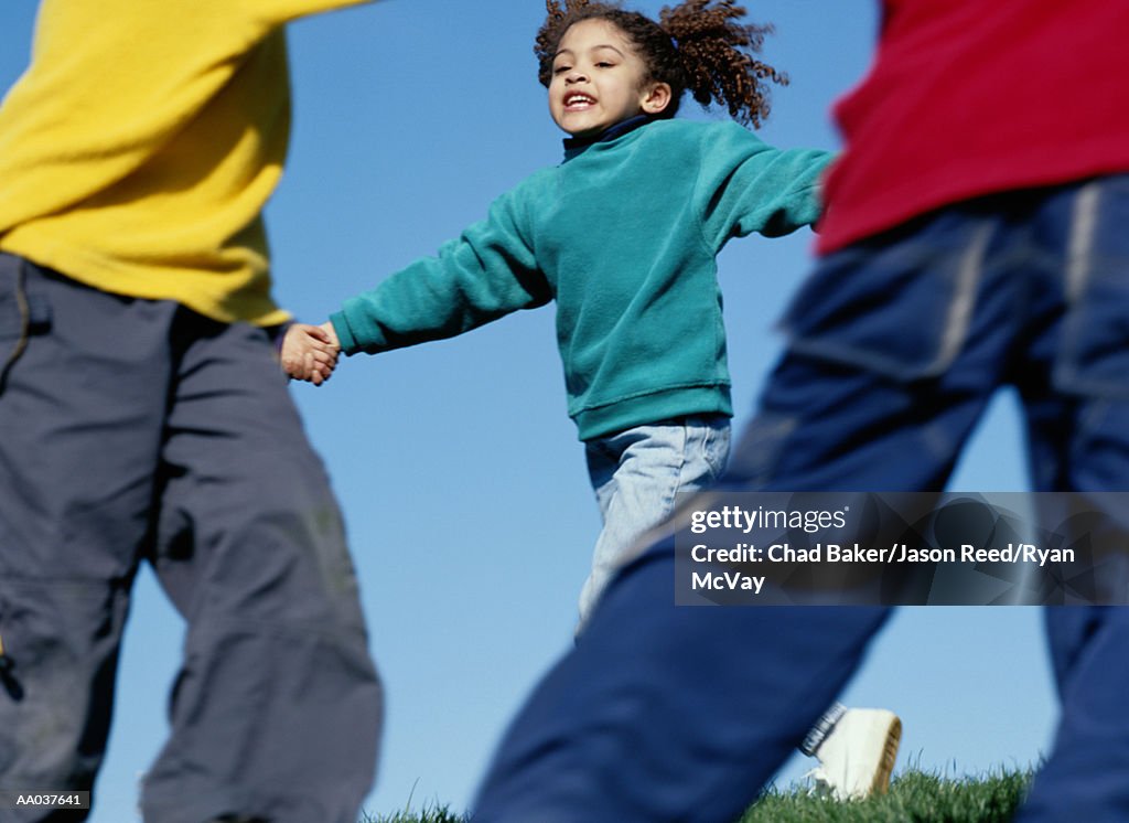 Children Playing Ring-Around-The-Rosy