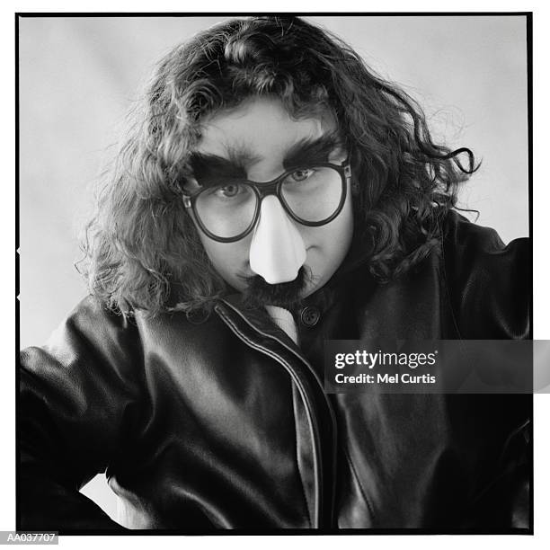 girl in a groucho marx disguise - groucho marx disguise stock pictures, royalty-free photos & images