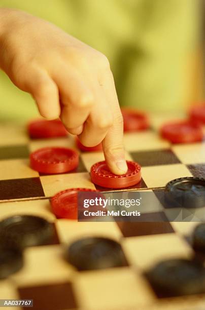 Checker Game Pieces Photos and Premium High Res Pictures - Getty Images