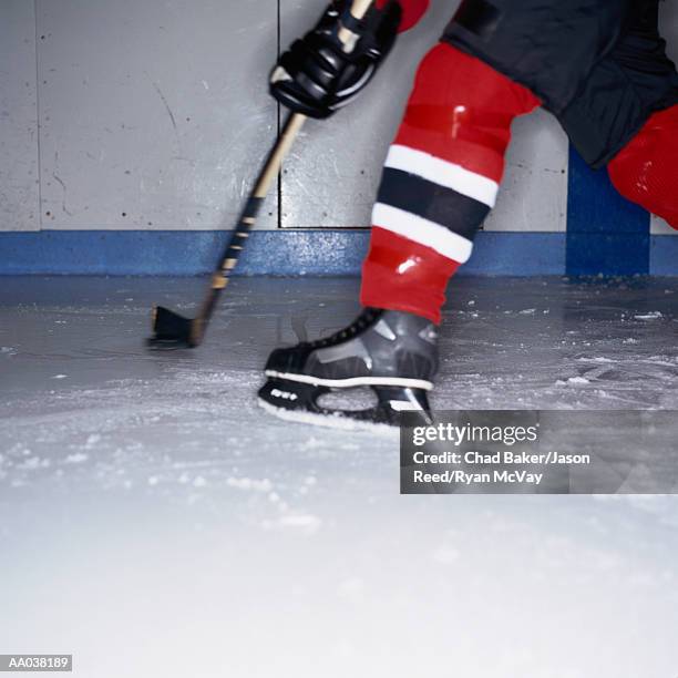 ice hockey player - ice hockey uniform stock pictures, royalty-free photos & images