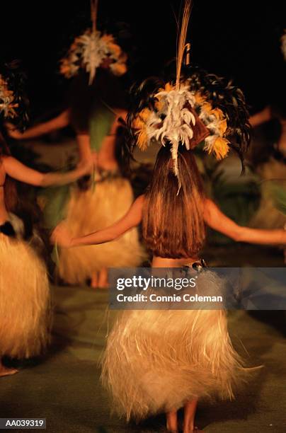 usa, hawaii, maui, women hula dancing at luau, rear view - connie stock pictures, royalty-free photos & images