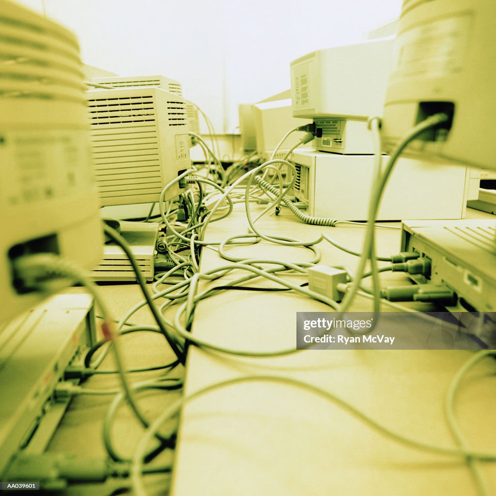 Computer System Tangled Tangled Computer Cords In Classroom Computer Lab High-Res Stock Photo ...