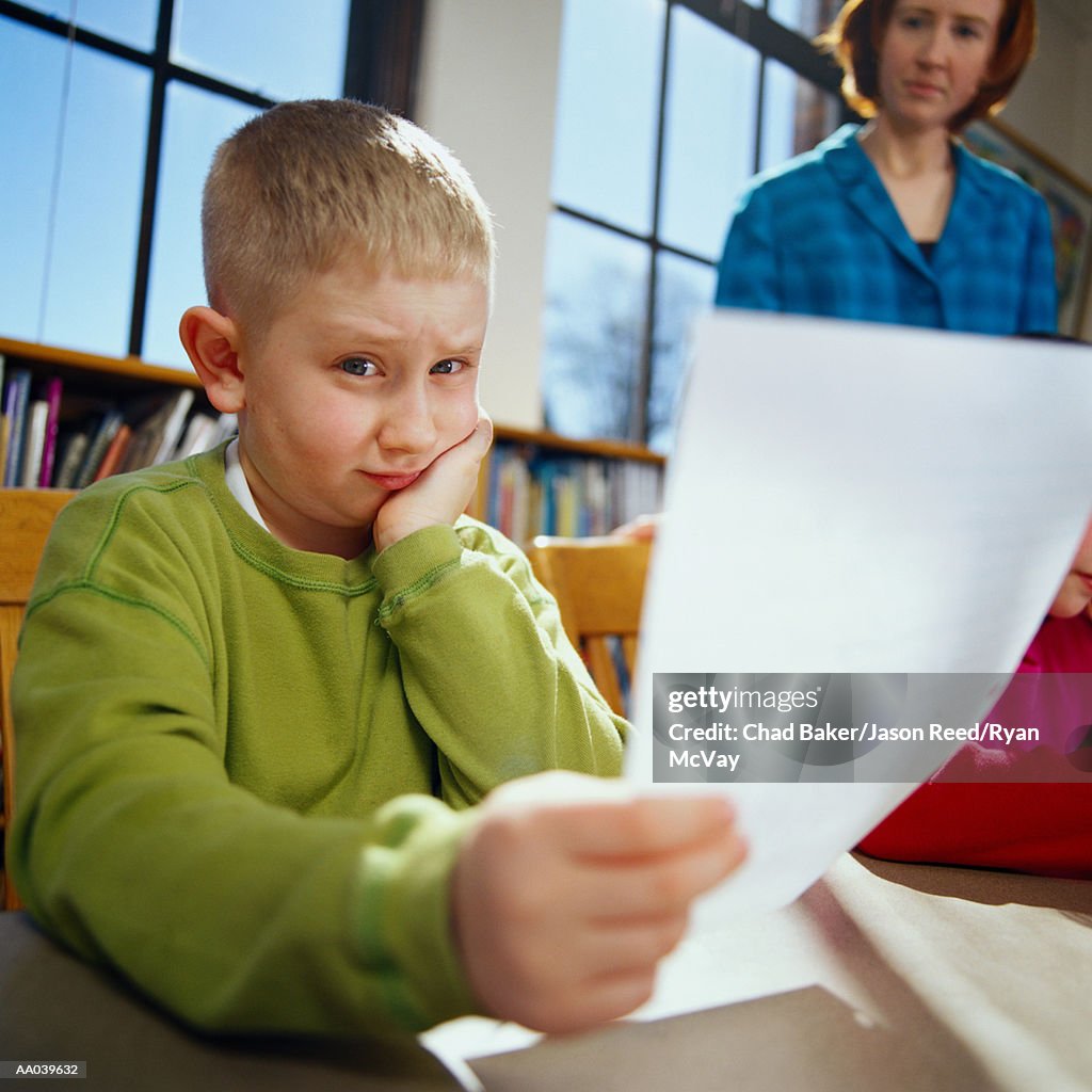 Worried Boy Studies School Work