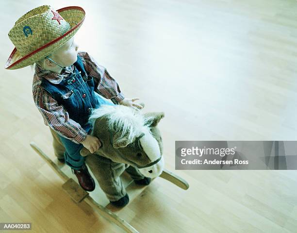 toddler girl (21-24 months) on rocking horse, elevated view - one baby girl only bildbanksfoton och bilder