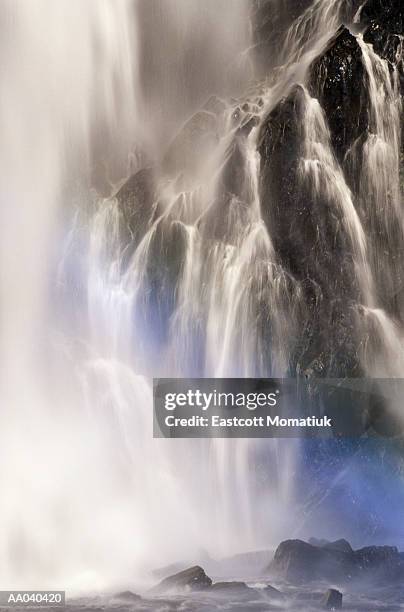 waterfall with rainbow - south central alaska stock pictures, royalty-free photos & images