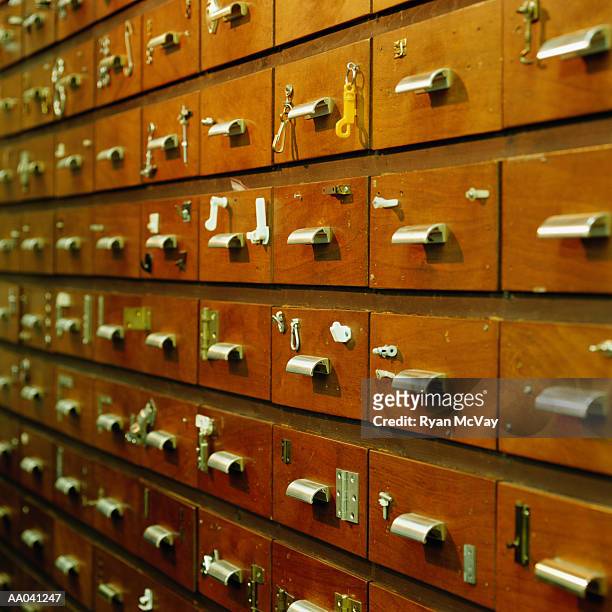 rows of drawers in a hardware store - latch stock-fotos und bilder