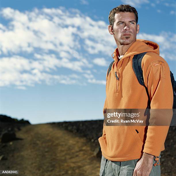 man hiking in volcanic crater - soul patch stock pictures, royalty-free photos & images