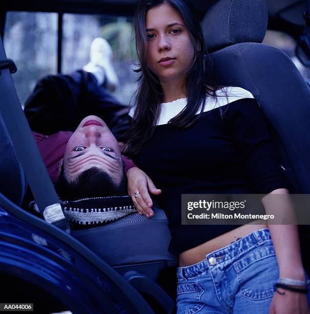 teenagers lounging in a car - ancine and car stock pictures, royalty-free photos & images