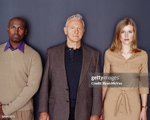 business men and woman standing in line-up - lineup fotografías e imágenes de stock