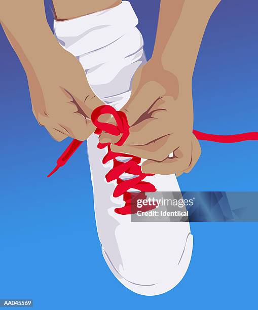 tying shoe lace - tying shoes stock illustrations